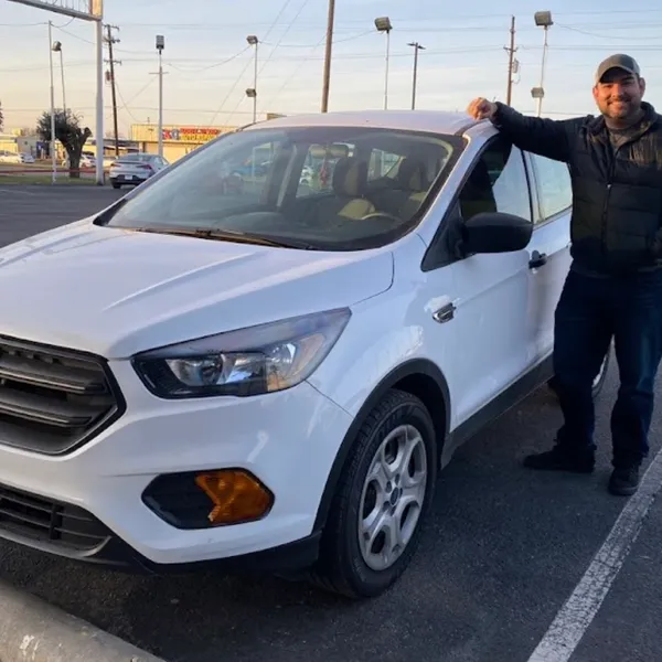 Customer with his new Ford Escape