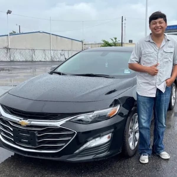 Customer with his new Chevy Malibu